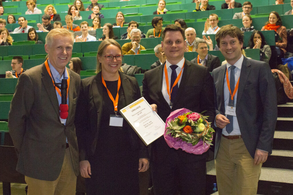 Paul Langerhans Award Ceremony: Awardee: Kilian Eyerich (2. r.), left: M. Hertl (Chair of the prize committee), 2nd left: Natalie Nunez (Representative of the sponsor Biogen GmbH), right: M. Metz (ADF Board)