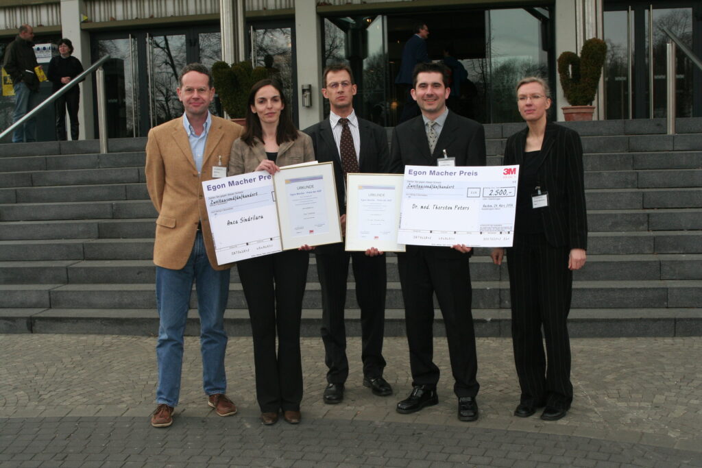 Egon Macher Award winner, representative of the sponsor 3M Medica GmbH, and member of the ADF Board of Directors